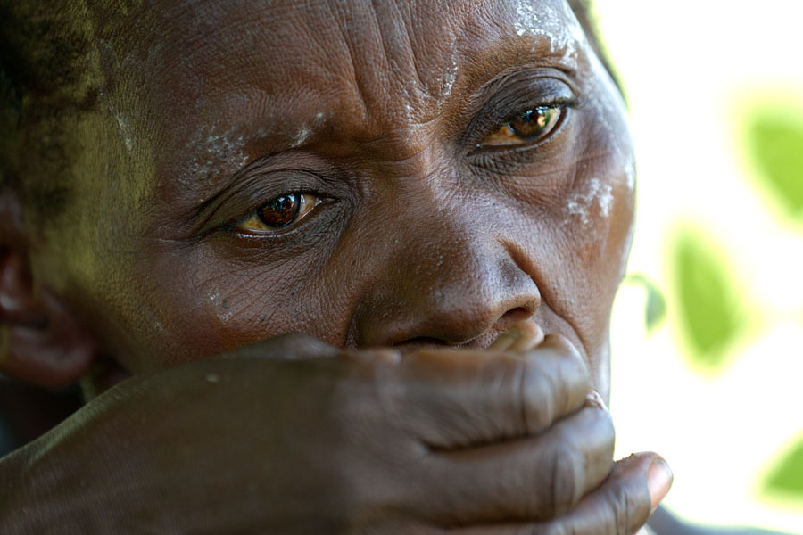  Sniffing tobacco during a ceremonial dance of the Tharaka tribe. Kenya